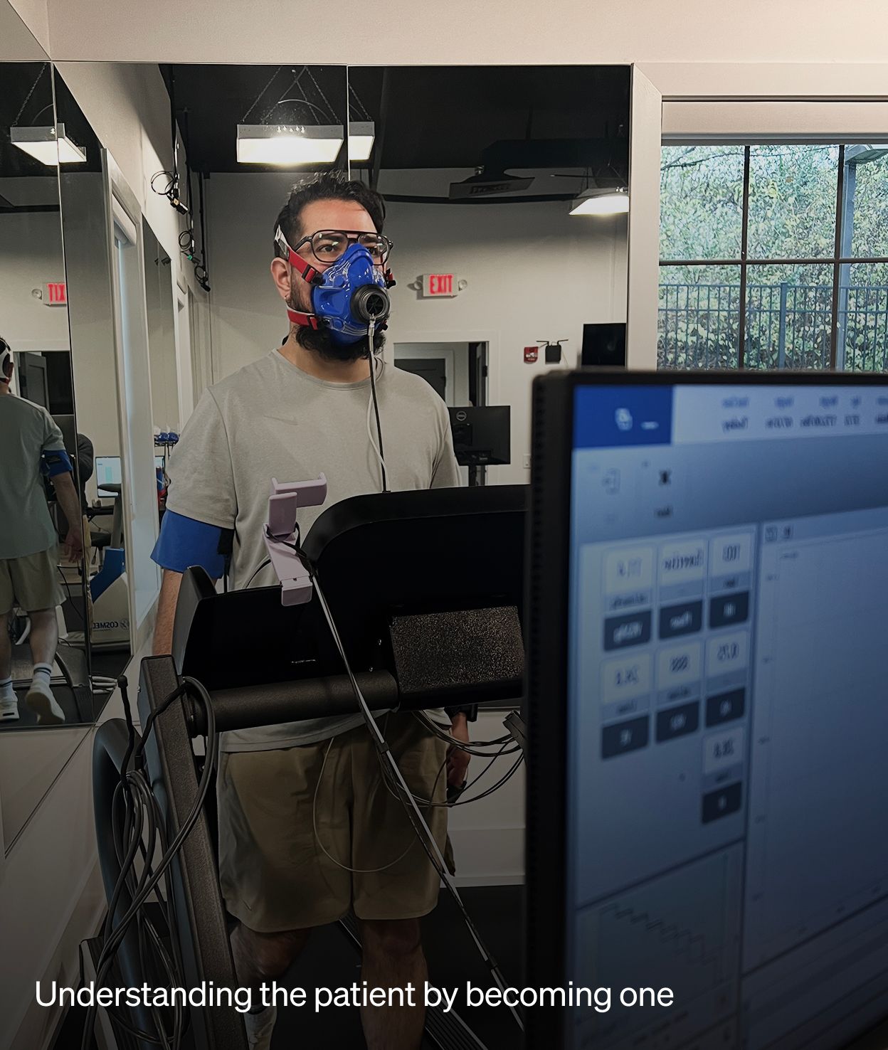 Ricardo on a treadmill in a VO2 mask during a metabolic test at the practice